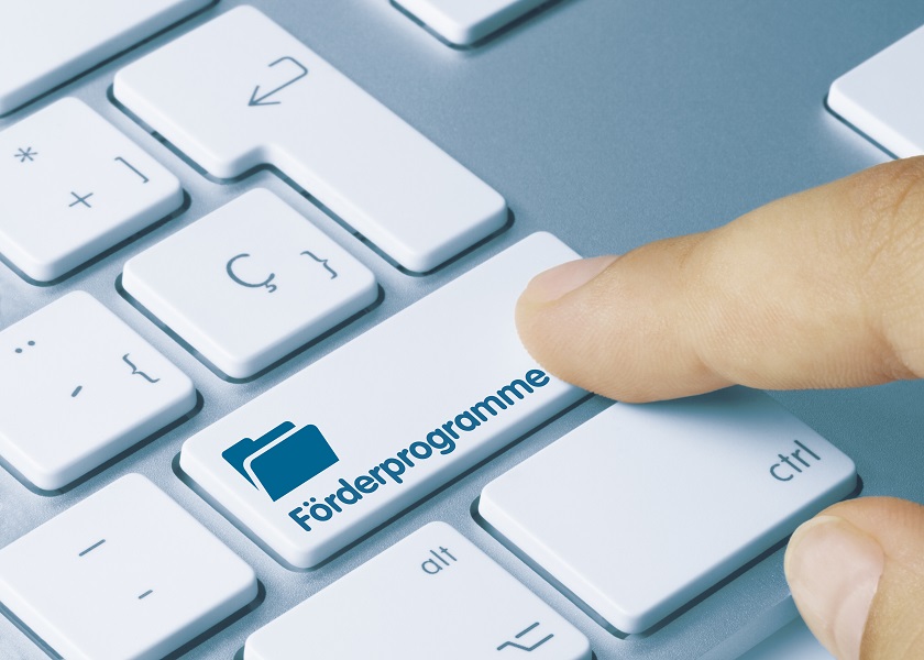 Tastatur mit dem Schriftzug Programme